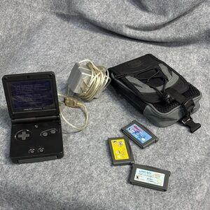 Nintendo Game Boy Advance SP Handheld Console  with charger and 4 games and bag